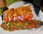 Creamy suya-infused penne pasta with chicken, peppers and onions. (3)